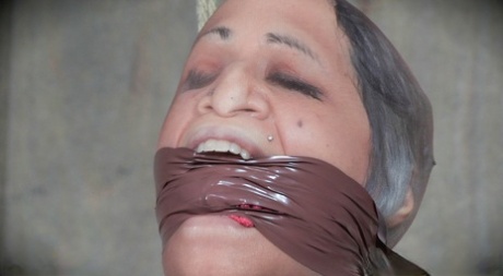 Restrained female Alyssa Lynn endures tits torture and and being hung