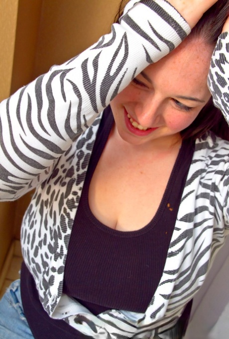 Horny Gemma in jeans gets naked in the bathroom to show her hot BBW body