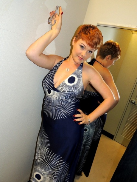 Redheaded amateur Kali Devine uncovers her natural tits before giving a BJ