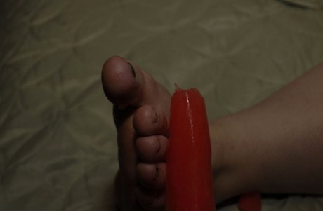 Redheaded BBW Inked Oracle is flogged and tortured while tied to a bed