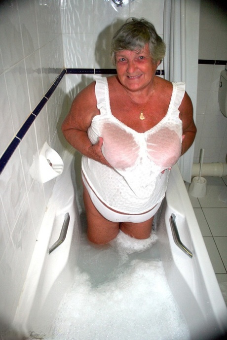 Obese old woman Grandma Libby gets completely naked while having a bath