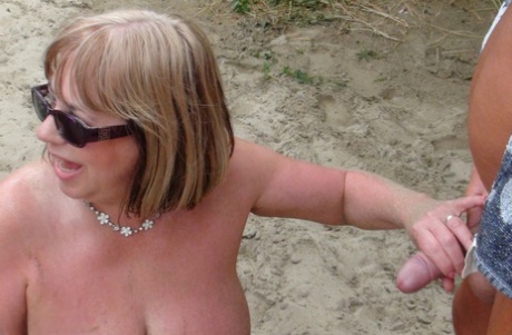 Huge titted mature slut & Speedy Bee suck multiple cocks outdoors