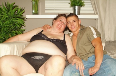 SSBBW sucks a young boy's dick before he slam's his hard cock into her pussy