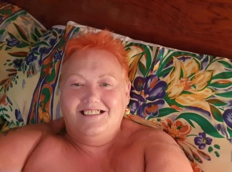 Fat granny with red hair Valgasmic Exposed takes naked selfies at home