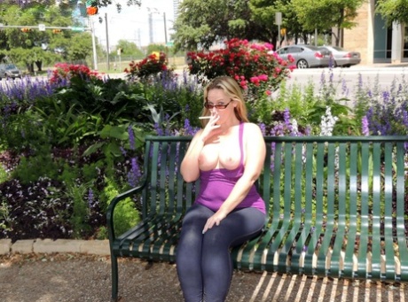 Fat blonde Dee Siren exposes herself in public before pussy play in a vehicle