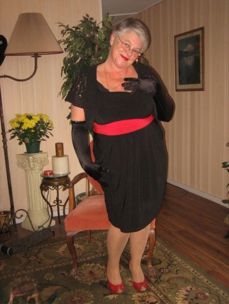 Old fatty Girdle Goddess fondles saggy tits in black velvet gloves and hose