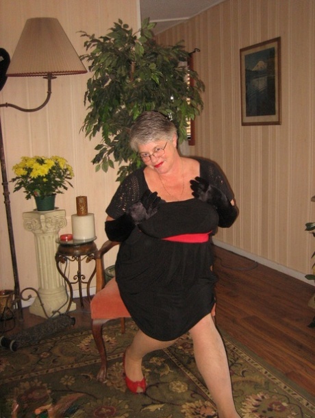 Old fatty Girdle Goddess fondles saggy tits in black velvet gloves and hose