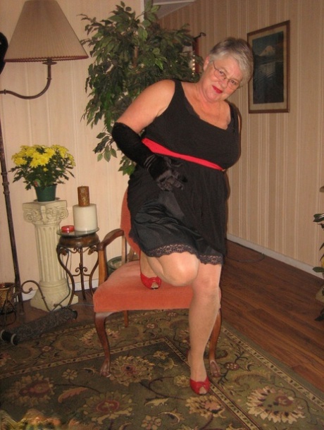 Old fatty Girdle Goddess fondles saggy tits in black velvet gloves and hose