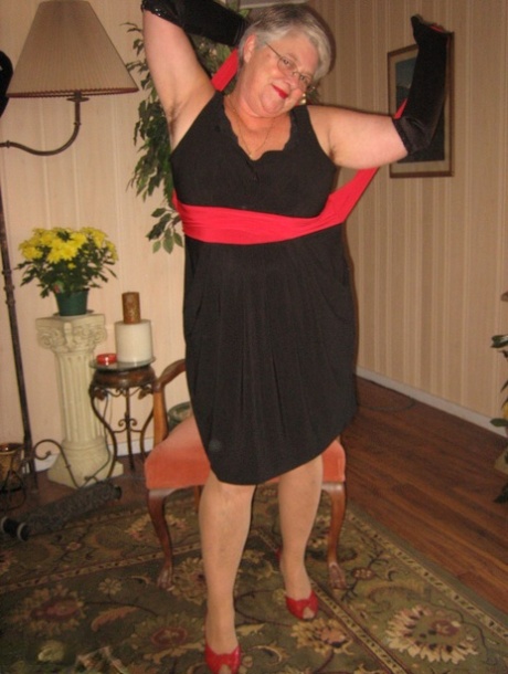 Old fatty Girdle Goddess fondles saggy tits in black velvet gloves and hose