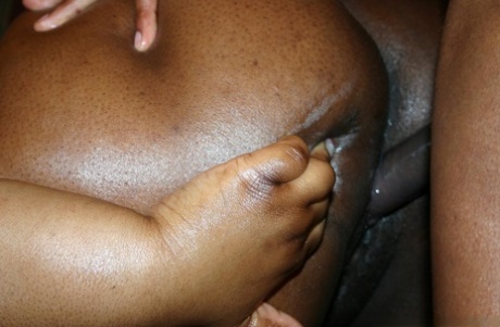 Ebony fatty displays her oily body before sex with her ebony lover