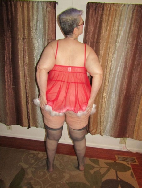 Fat nan Bunny Gram takes off sexy lingerie and thong before rolling off nylons