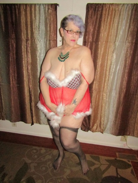 Fat nan Bunny Gram takes off sexy lingerie and thong before rolling off nylons