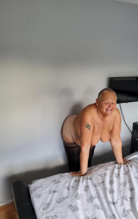 Overweight granny Valgasmic Exposed sheds her lingerie to pose nude in hosiery