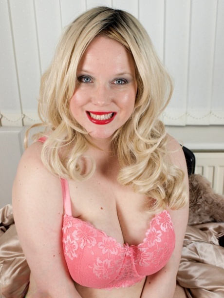 Fat blonde Sindy Bust gets naked with her panties around her ankles