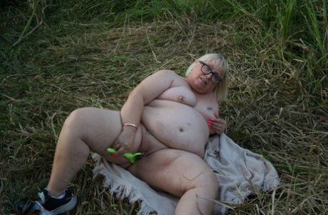 Obese British woman Lexie Cummings gets naked while out in the country