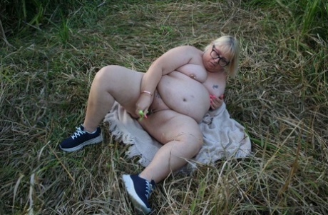 Obese British woman Lexie Cummings gets naked while out in the country