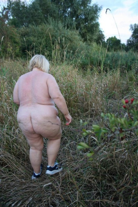 Obese British woman Lexie Cummings gets naked while out in the country