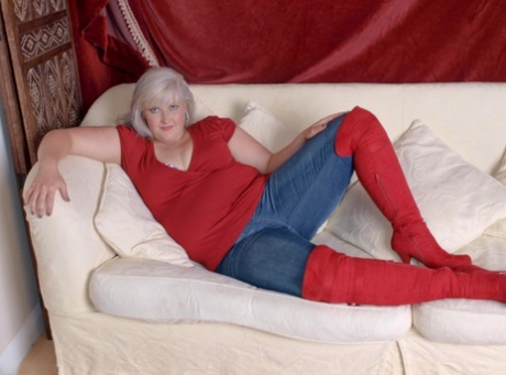 Fat blonde Samantha releases her big butt from denim jeans in suede OTK boots