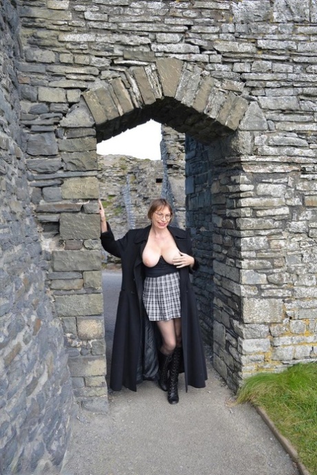 Older British lady Barby Slut goes topless at home before flashing in public