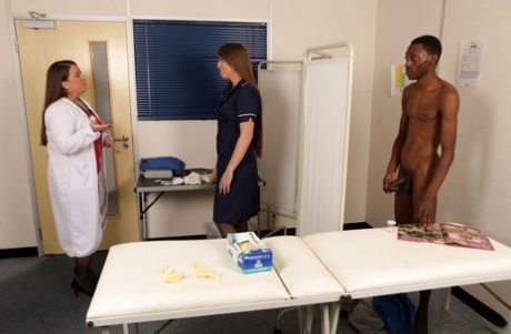 British nurses Sasha Blue and Violet Whisper give an interracial CFNM blowjob