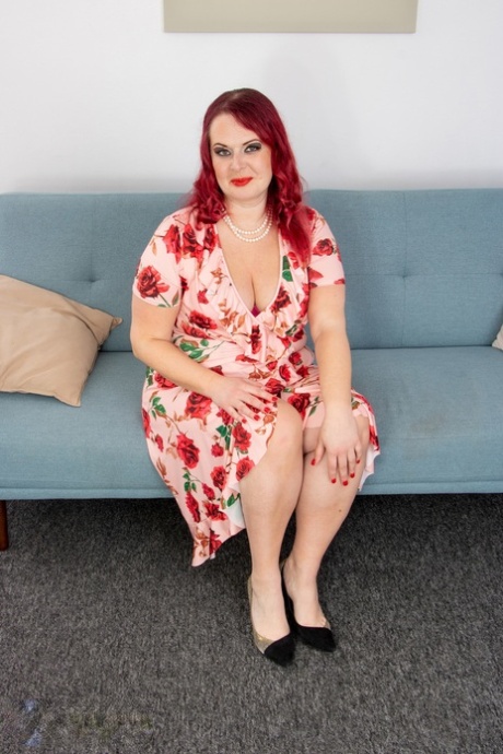 Overweight middle-aged woman Juliet Redhead gets bare naked while masturbating