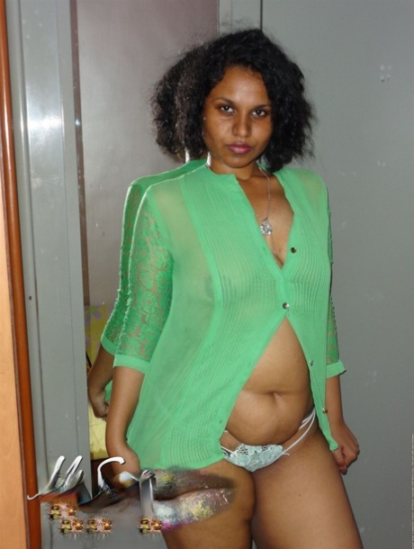 Chubby Indian woman Lily Singh sets her big natural tits free of her shirt