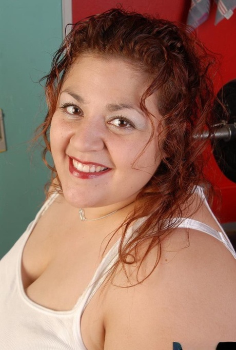 Fatty mature SSBBW Reyna poses in the locker room naked on cam
