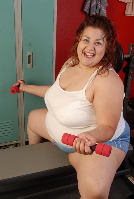 Fatty mature SSBBW Reyna poses in the locker room naked on cam