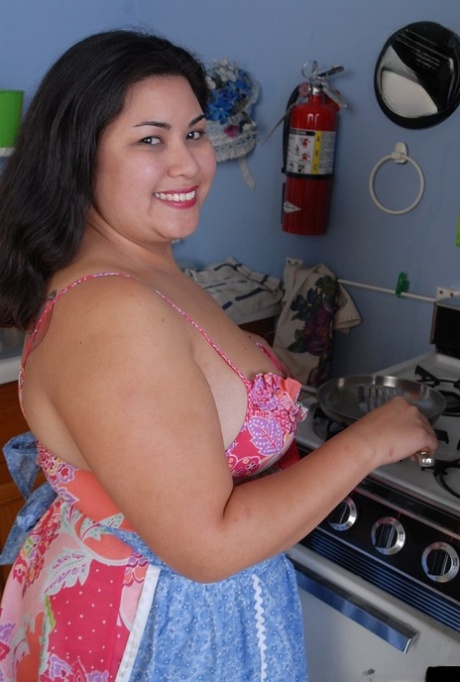 BBW Tyung stripping nude and licking her own nipples in kitchen