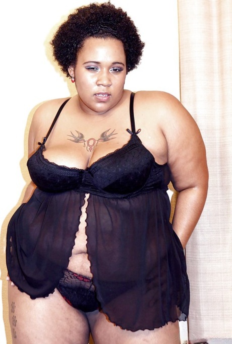 Black fatty Kitten removes lingerie to expose her big fat ass