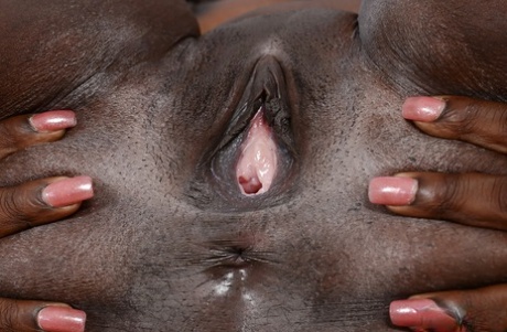 Afrikan first timer Black Dahlia showing off pink pussy and big butt