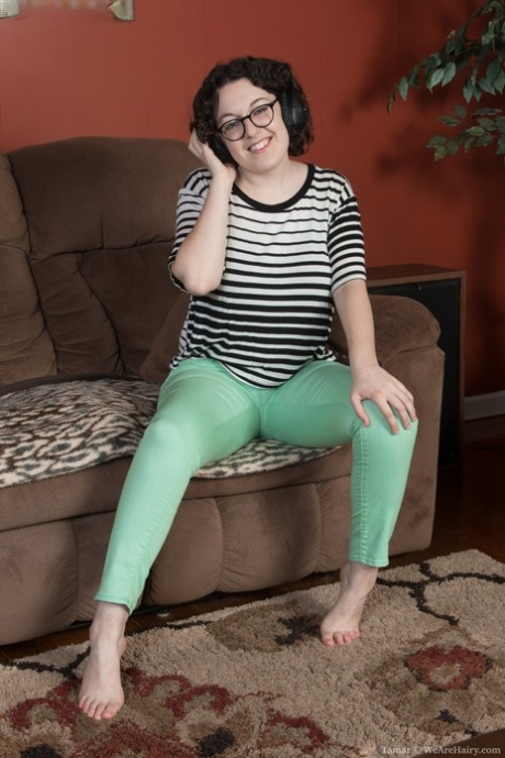 Chubby brunette in glasses Tamar spreading her welcoming hairy pussy