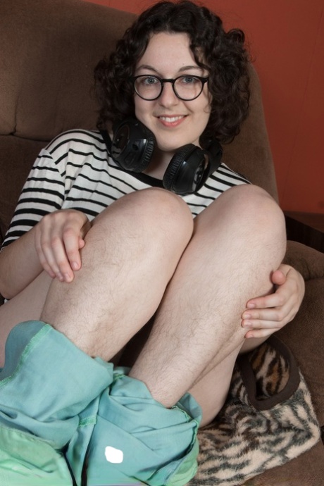 Chubby brunette in glasses Tamar spreading her welcoming hairy pussy