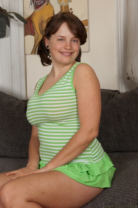 Amateur fatty Celia unveils her massive tits and toys her bushy cunt