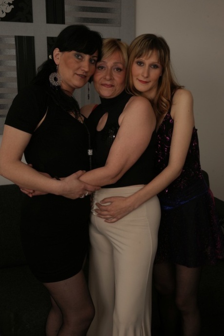Three kinky mature Europeans strip slowly and lick one another's swollen pussy