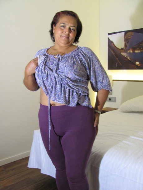 Chubby mature woman Coral toying her fat pussy and touching her monster ass