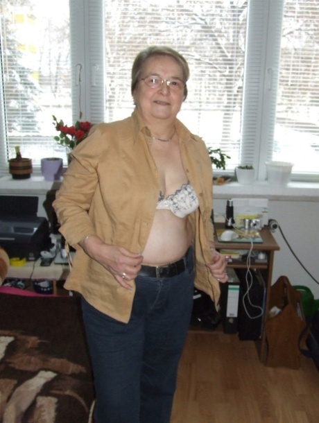 Fat European granny Sybille stripping off her clothes and skin tone tights