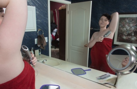 Big boobed chubby doll Dmitri Vosche brushing her furry pussy in the bathroom