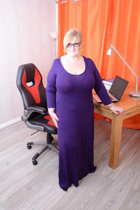 Chubby British secretary Jay licks her big tits and masturbates at work