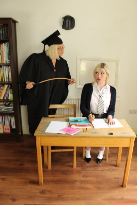 Granny headmistress Lacey Starr ass lashing a schoolgirl & licking her pussy