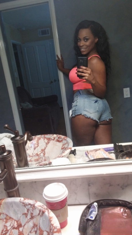 Stunning ebony Tori Taylor exposes her big boobs and rides a black boner