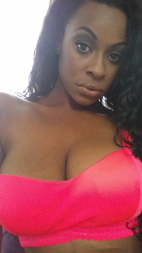 Stunning ebony Tori Taylor exposes her big boobs and rides a black boner