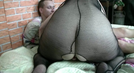 Dominant granny with glasses Dana whips and fucks her younger lover