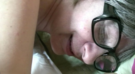 Dominant granny with glasses Dana whips and fucks her younger lover