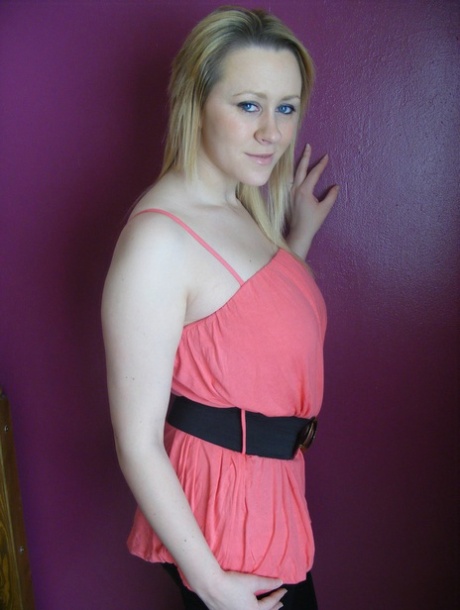 Busty blonde teen Larissa strips naked to show her big tits & her tasty pussy