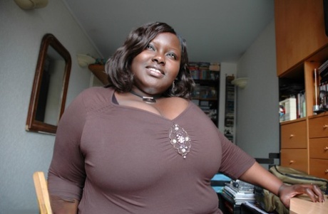 Amateur ebony Mariana Kodjo lets out her massive tits and shows them up close