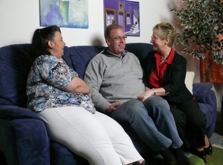 Two busty mature BBWs get fucked by an older dude with glasses in a threesome