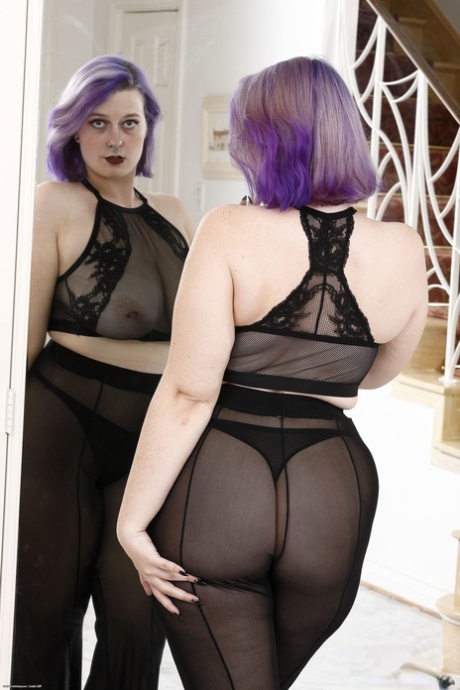 Chubby American Nyx Night shows her big tits, ass and hairy pussy in a solo