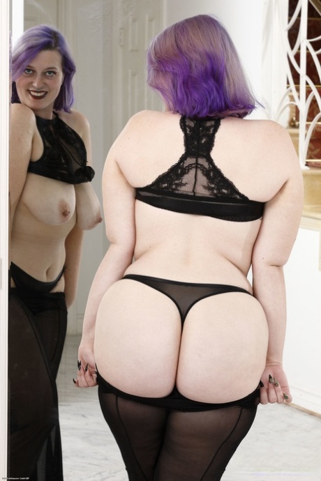 Chubby American Nyx Night shows her big tits, ass and hairy pussy in a solo