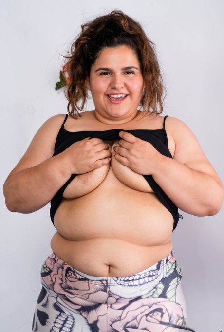 Chubby amateur Karla Lane unveils her huge tits and flaunts her hairy pussy